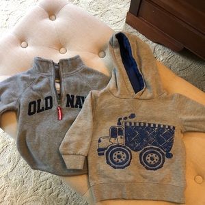 One hooded sweatshirt and one quarter zip